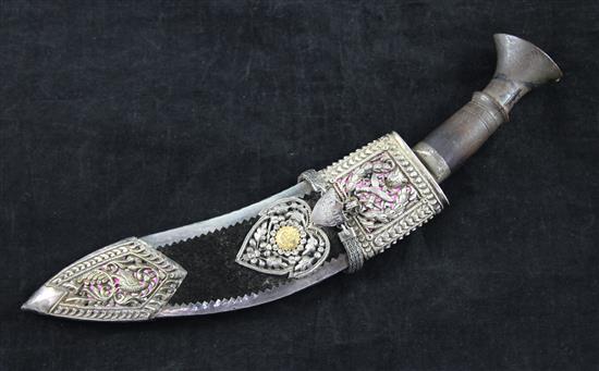 A kukri with silver mounted scabbard, overall 14in.